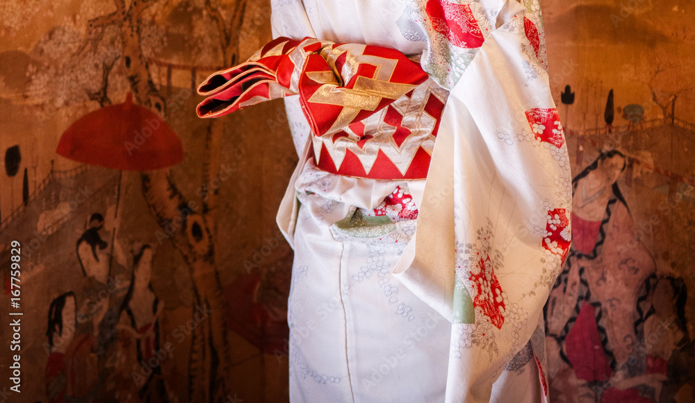 Japanese woman in Kimono dress, close up at Obi.