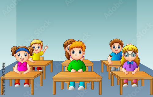 School kids studying in classroom