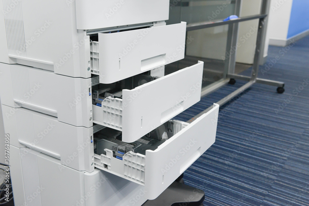 Opened printer tray for business printing Opened printer tray for business printing