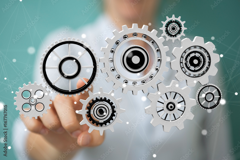 Businesswoman using floating gear icons 3D rendering Businesswoman using floating gear icons 3D rendering