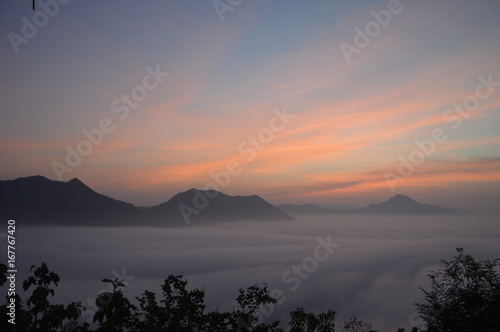 The misty sea in the sunrise atmosphere.