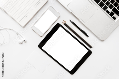 gadget accessories on white table,blank screen smart phone and tablet computer,isolated on white background