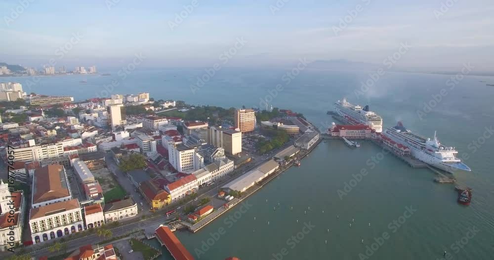 Cruise Liners Docked at Georgetown, Penang, Malaysia, Aerial Pan Shot
Cruise Liners Docked at Georgetown, Penang, Malaysia, Aerial Pan Shot