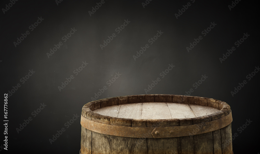 background of barrel and worn old table of wood