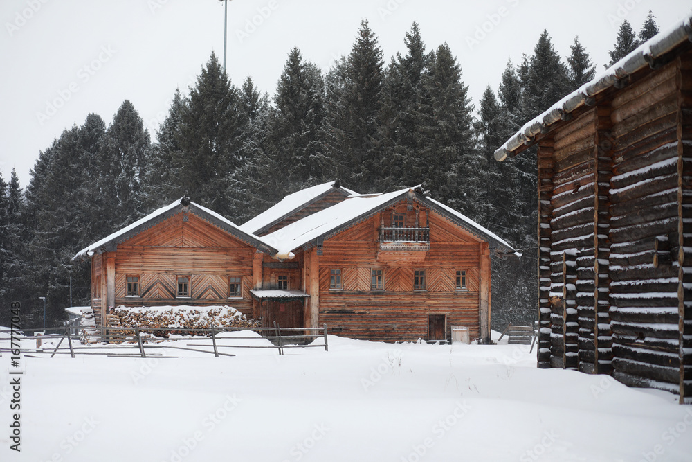 retro wooden house in the forest in russian north