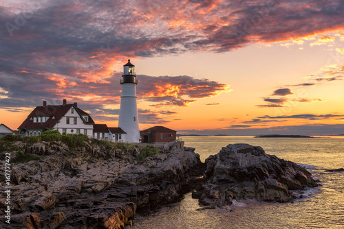 The Portland Head Lighthouse at sunrise in Cape Elizabeth, Maine, USA. 