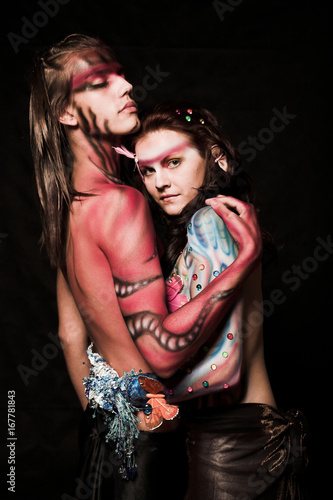 Loving couple with body art