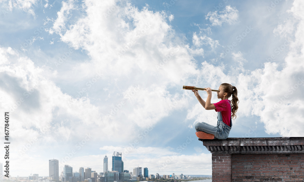 Concept of careless happy childhood with girl exploring this world Concept of careless happy childhood with girl exploring this world