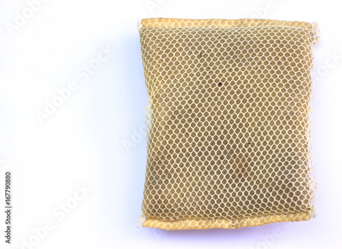 dirty scourer on a white background