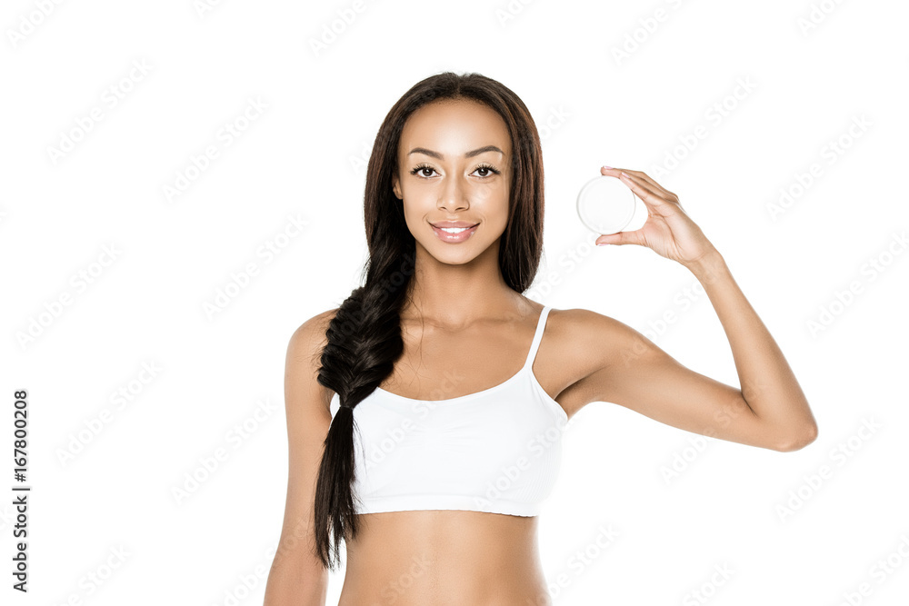 african american woman with cream in hand african american woman with cream in hand