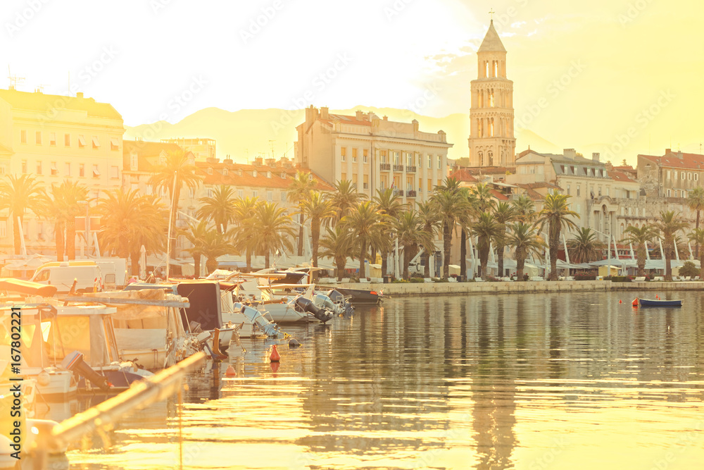 Split city at golden hour with boats moored in its harbor - Dalmatia, Croatia
