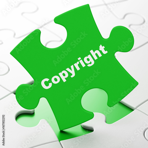 Law concept: Copyright on puzzle background