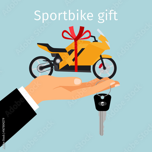 Man hand holding gift sportbike