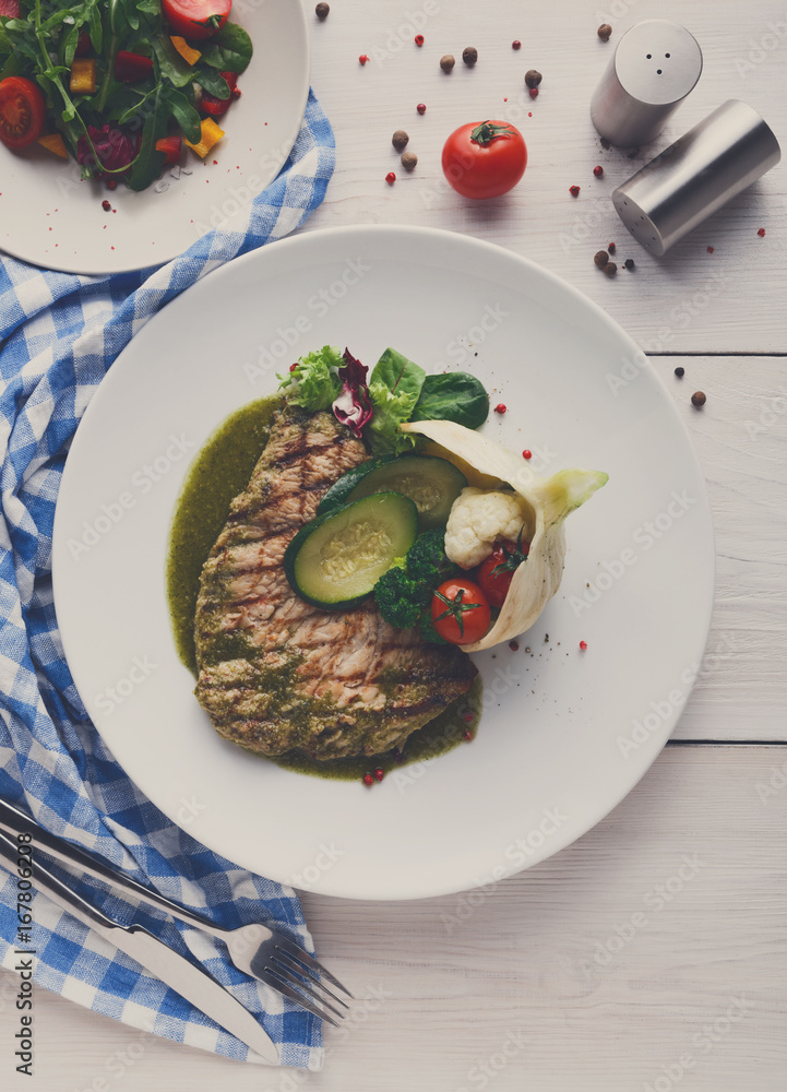 Grilled beefsteak with vegetables and green bell pepper sauce Grilled beefsteak with vegetables and green bell pepper sauce