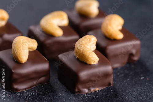 Handmade chocolate bonbons with cashew
