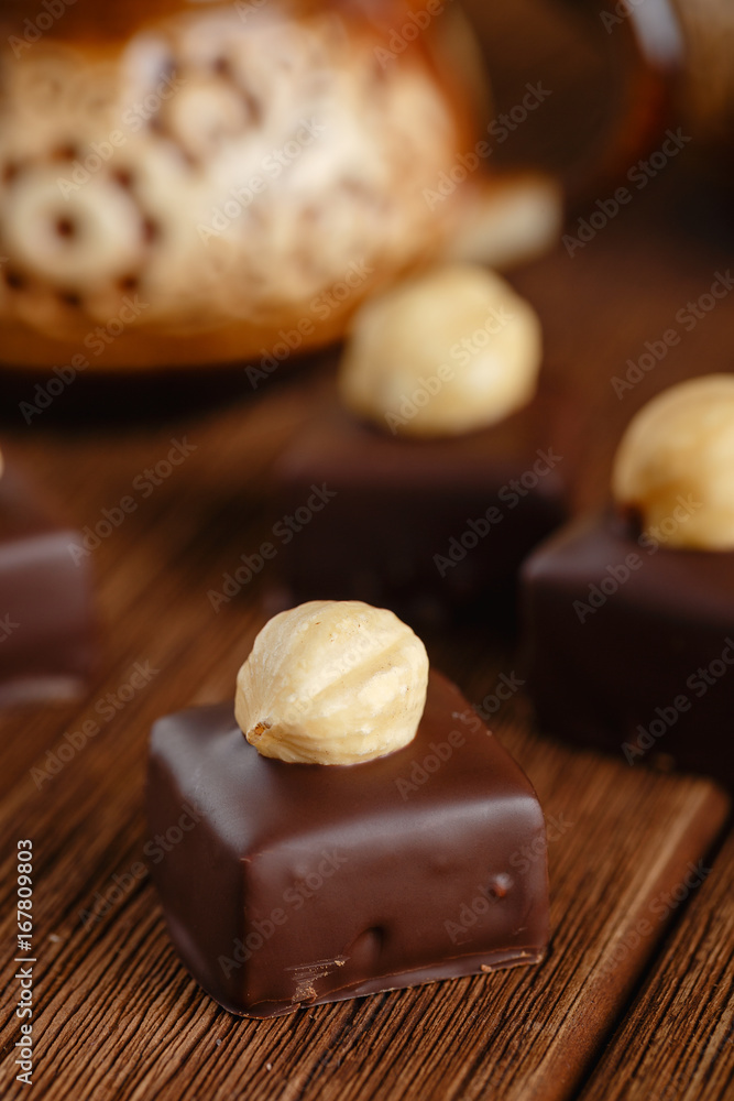 Handmade chocolate bonbons with hazelnut Handmade chocolate bonbons with hazelnut
