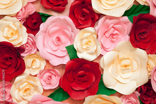 Holiday colorful background of paper flowers