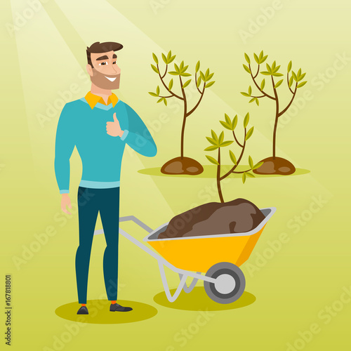 Caucasian gardener with wheelbarrow standing on the background of newly planted trees. Hipster gardener pushing wheelbarrow with tree and dirt in park. Vector flat design illustration. Square layout.