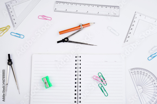 Back to School concept. Studying elements on a white background in a top view or flat lay