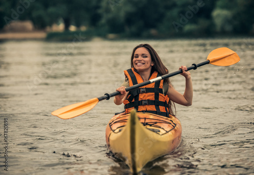 Woman and kayak