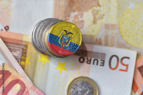 euro coin with national flag of ecuador on the euro money banknotes background.