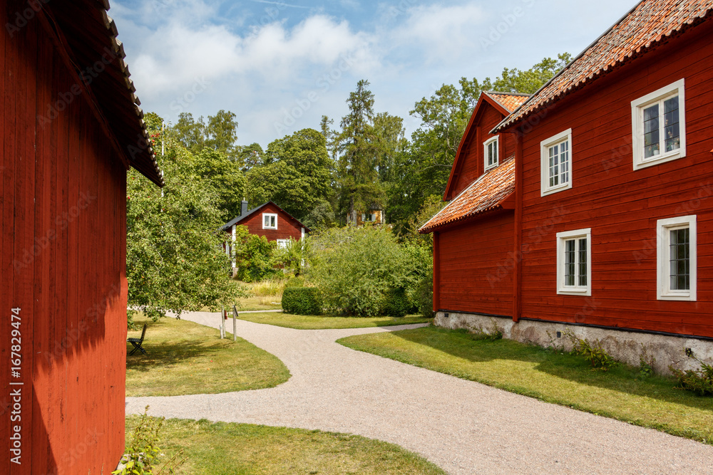 A typical Swedish old country houses in red with white windows