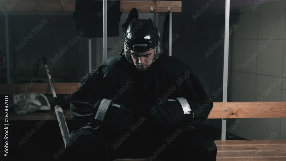 Hockey player portrait close up with helmet, professional forward defender in dressing room before game, canadian hockey agressive power portrait Hockey player portrait close up with helmet, professional forward defender in dressing room before game, canadian hockey agressive power portrait