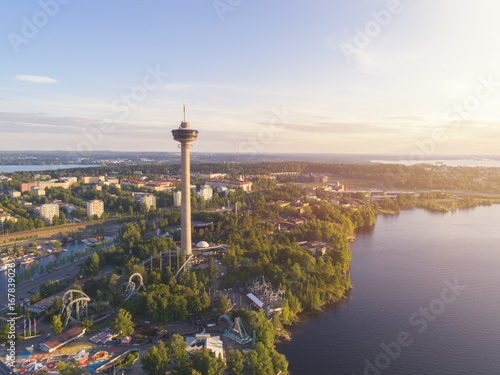 Aerial view of the Tampere city at sunset with colorful clouds photo
