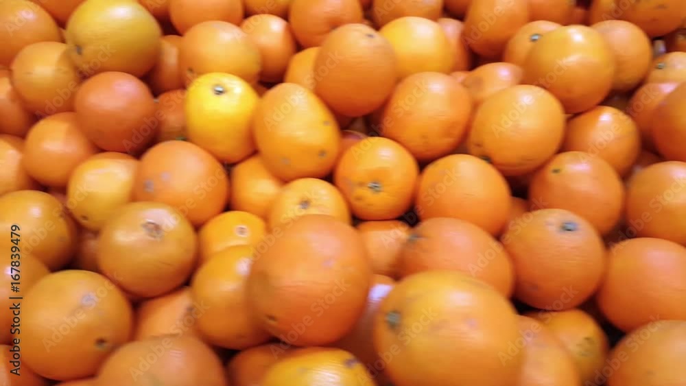 Pile of big orange in market, pan motion Pile of big orange in market, pan motion