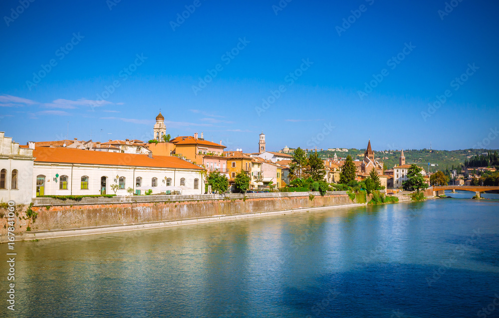 Obraz premium Beautiful old houses on Adige river in Verona, Veneto region, Italy.