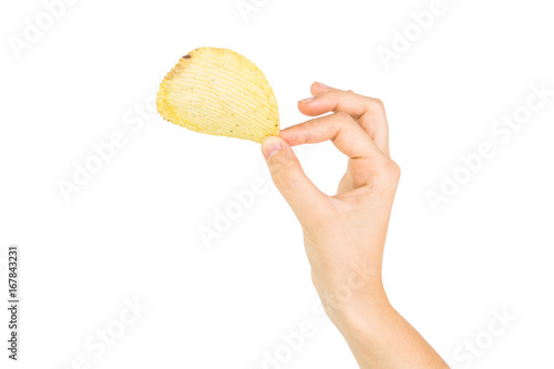 Hand Holding Wavy Potato Chip With Spices Isolated On White Background