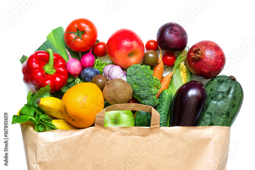 Fototapeta Naklejka Na Ścianę i Meble -  Full paper bag of different fruits and vegetables on a white background