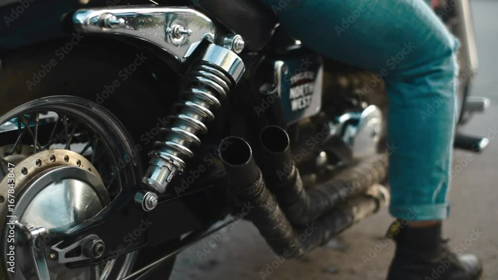 Moto girl give gas close up exhaust pipe Moto girl give gas close up exhaust pipe