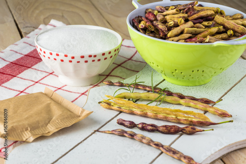 Cut mesquite beans.