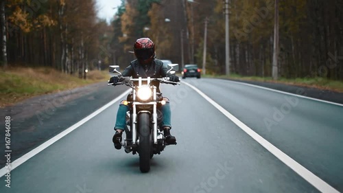 Active sexy girl riding on the motorbike, vintage style, happy adventure concept