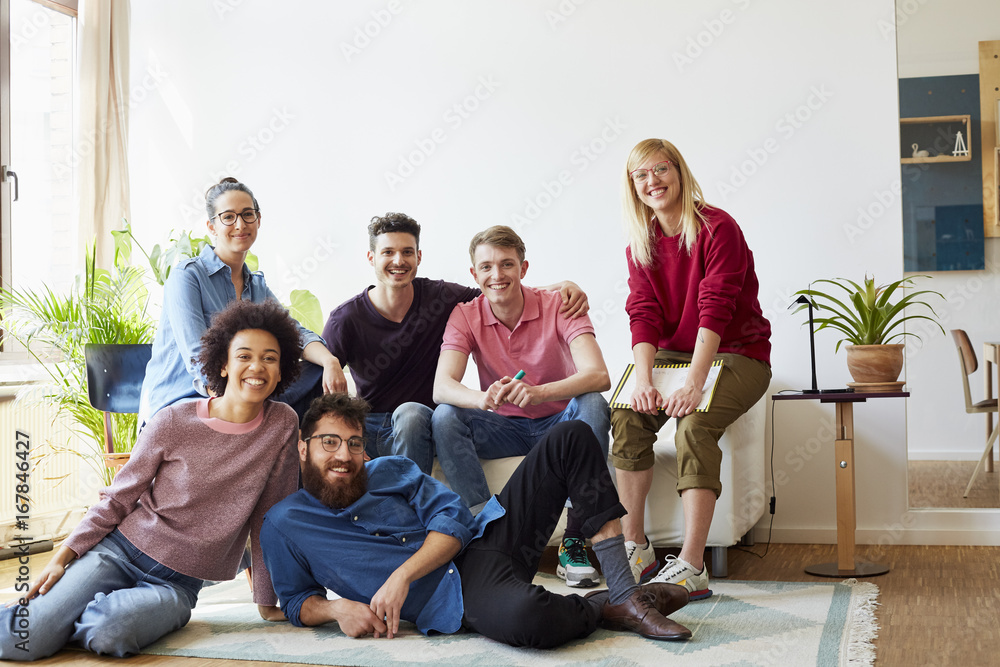 Portrait Of Confident Designers In Creative Office Portrait Of Confident Designers In Creative Office