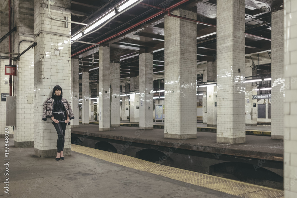 Senior Caucasian Woman Fashionista in New York Subway Station Platform Senior Caucasian Woman Fashionista in New York Subway Station Platform