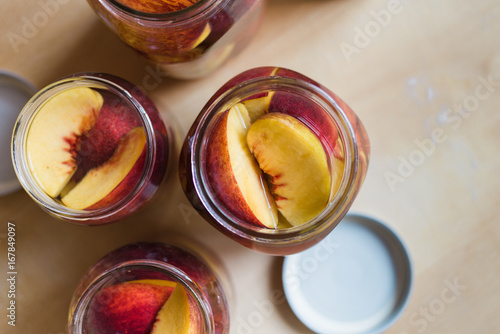 Making peaches in syrup preserve