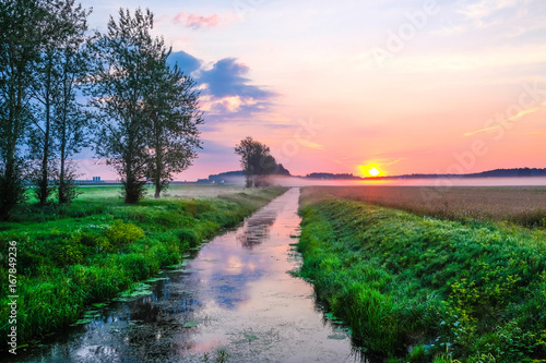 Landscape with the image of summer dawn