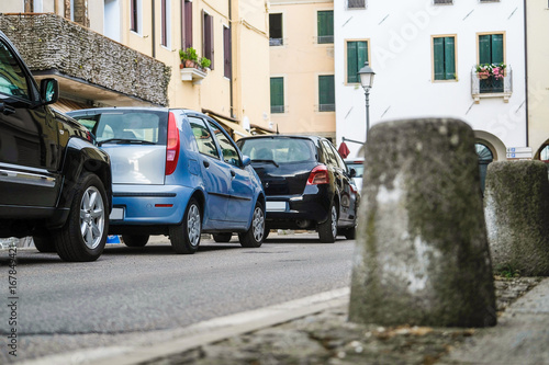 Arqua Petrarca, Italy - July, 27, 2017: car parking in Arqua Petrarca, Italy photo