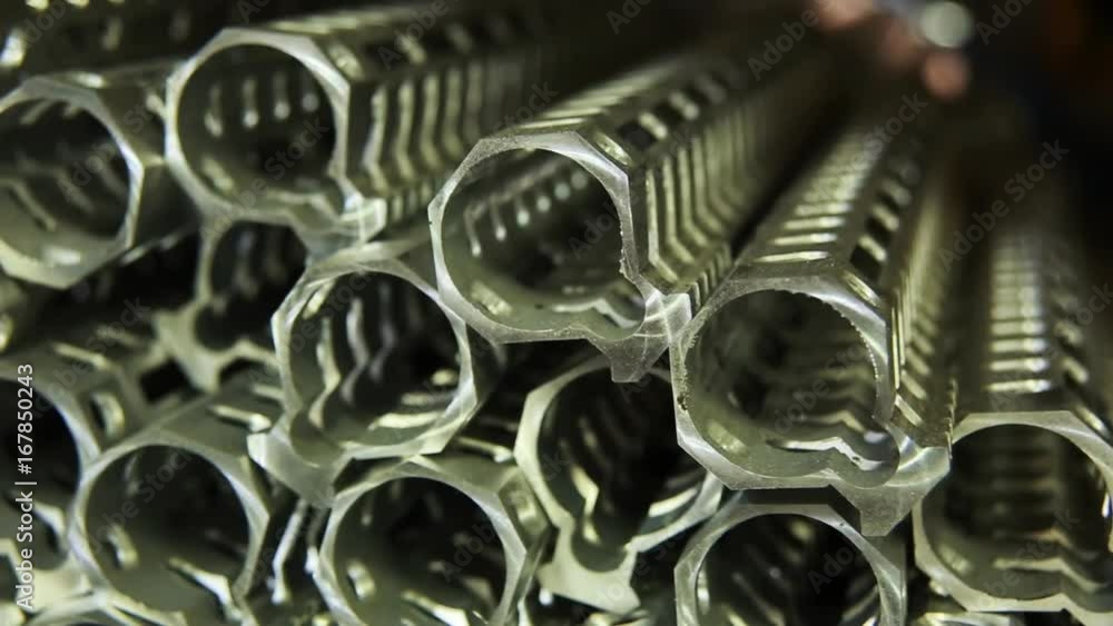 Close up, Long gun barrels in factory Close up, Long gun barrels in factory
