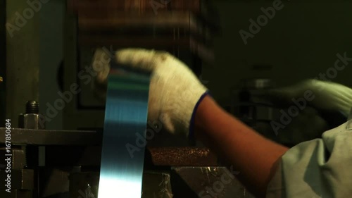 Machine presses flimsy metal in factory