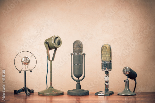 Retro old microphones for press conference. Vintage instagram style filtered photo