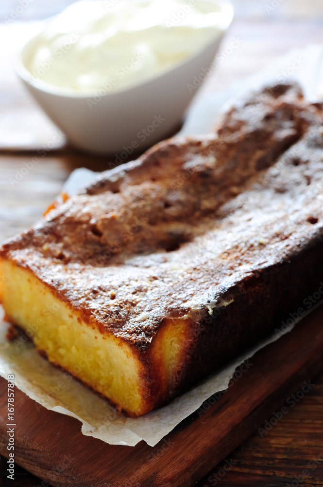 fresh baked lemon cake on wooden table fresh baked lemon cake on wooden table