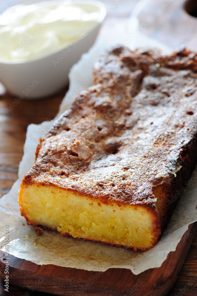 fresh baked lemon cake on wooden table fresh baked lemon cake on wooden table