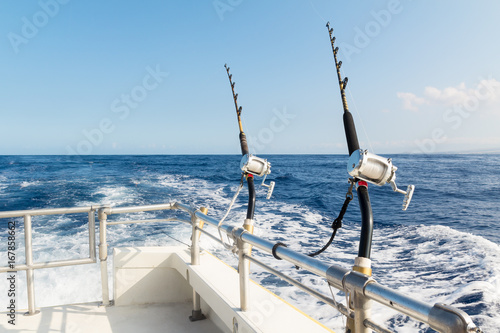 Deep sea fishing in Hawaii on a charter boat on a sunny day
