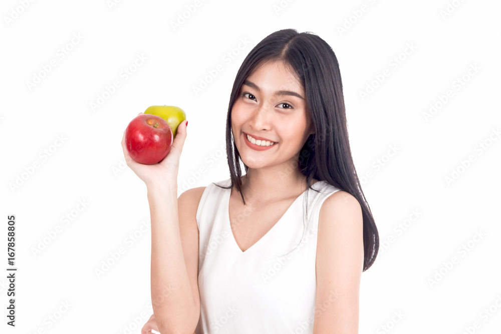 Beautiful woman holding an apple isolated on white background Beautiful woman holding an apple isolated on white background