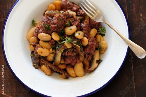 Fresh cooked meal with sausages, mushies photo