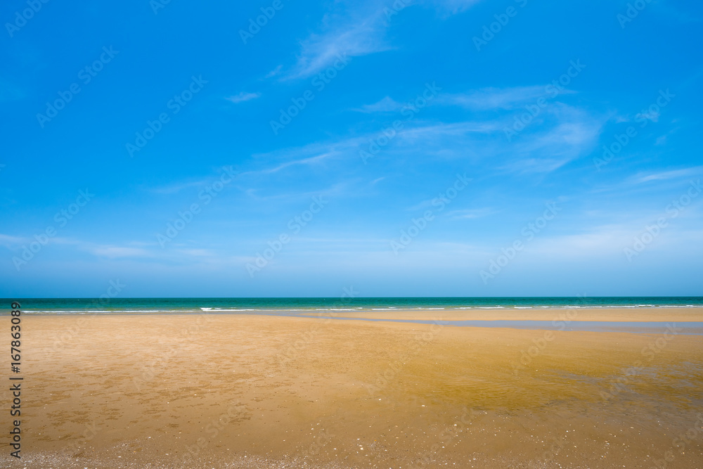 sea sand and blue sky background sea sand and blue sky background