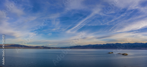 panoramic view rippled surface of cold sea at sunrise   © photollurg